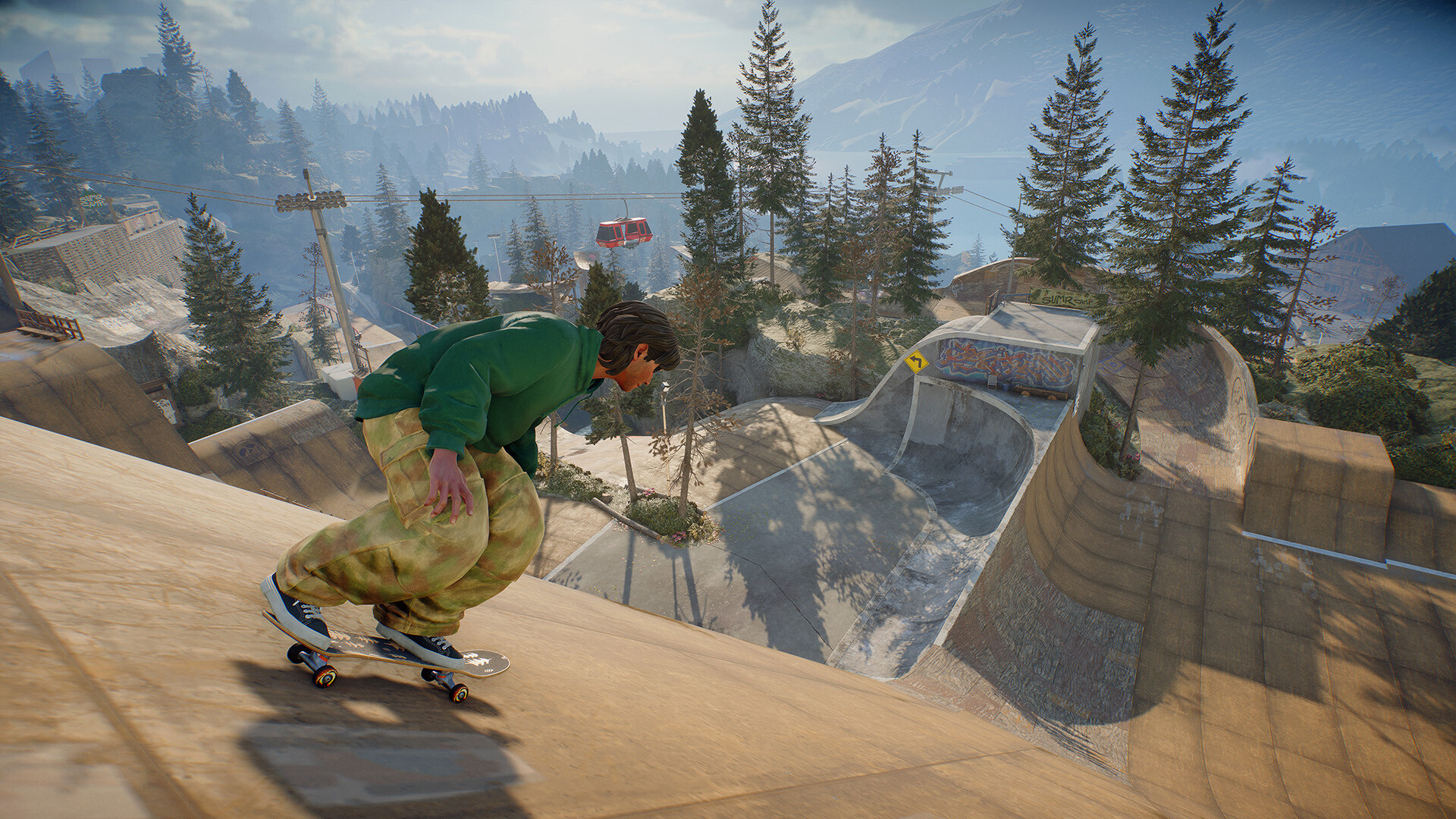A skater dropping into a large ramp surrounded by trees in skate.
